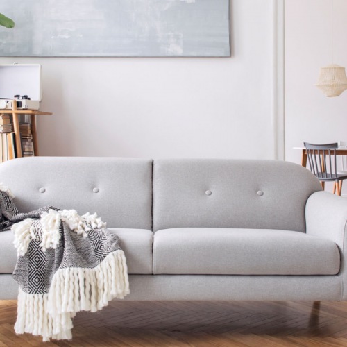 Large sofa in a well-lit room